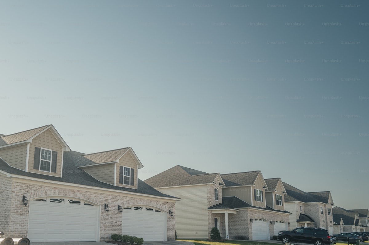 Freshly completed residential roof on suburban homes
